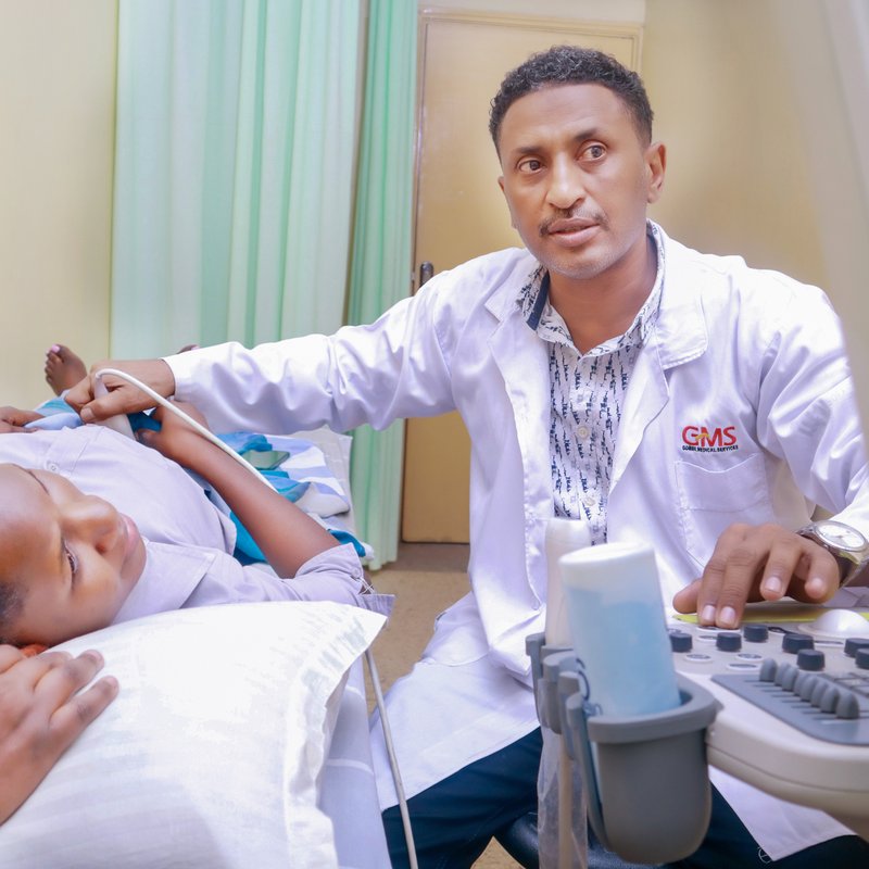 GMS clinician performing an ultrasound scan
